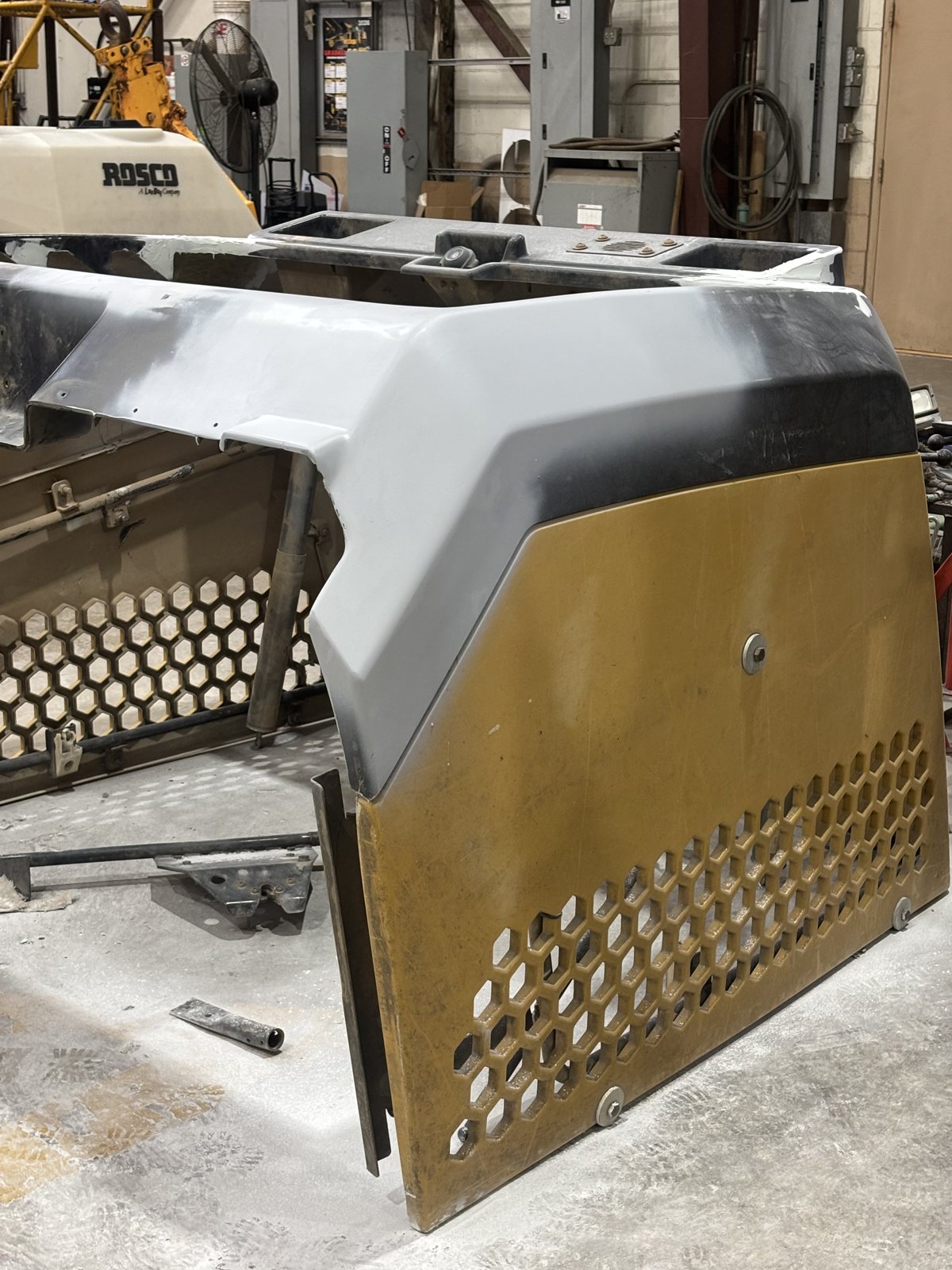 Equipment hood panel in primer, second angle